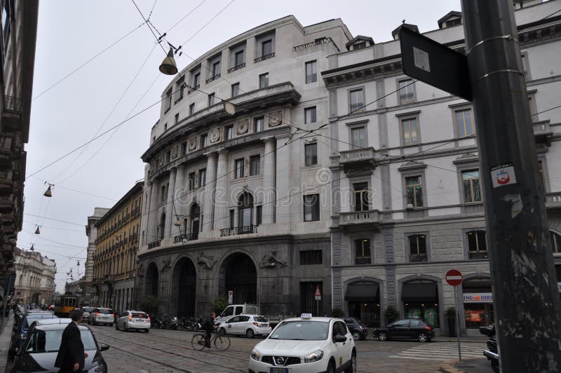 A beautiful gray building with stucco molding. Bank of Sicily in Milan. October 14, 2014, Milan, Italy. A beautiful gray building with stucco molding. Bank of Sicily in Milan. October 14, 2014, Milan, Italy