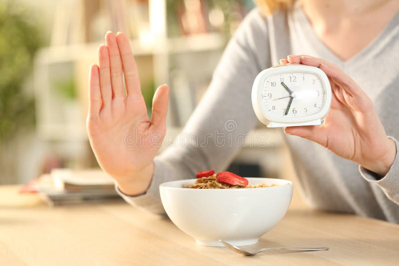 Close up of woman hands on intermittent fasting doing stop sign. Close up of woman hands on intermittent fasting doing stop sign