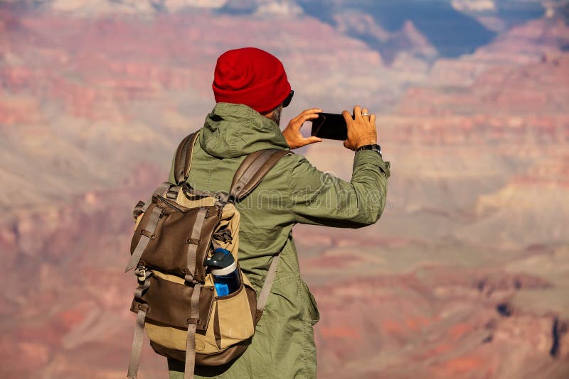 Een wandelaar in het Nationale Park van Grand Canyon, Zuidenrand, Arizona, de V.S. stock afbeelding Een wandelaar in het Nationale Park van Grand Canyon, Zuidenrand, Arizona, de V.S. stock afbeelding