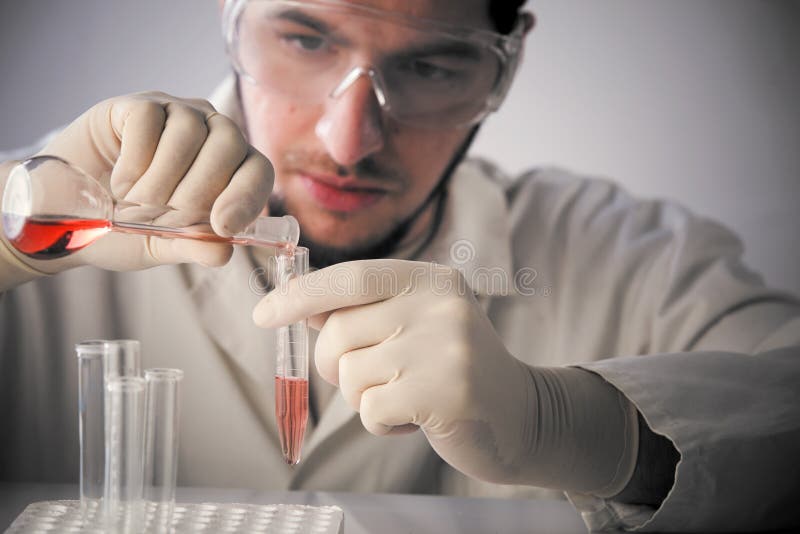 A scientist working in a lab on white background. A scientist working in a lab on white background