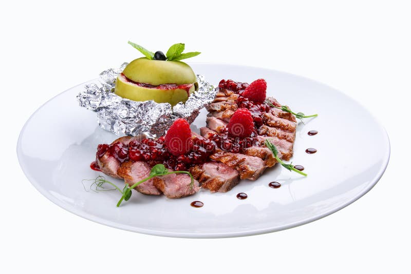 Eendborst met saus van framboos stock afbeelding Eendborst met saus van framboos stock afbeelding