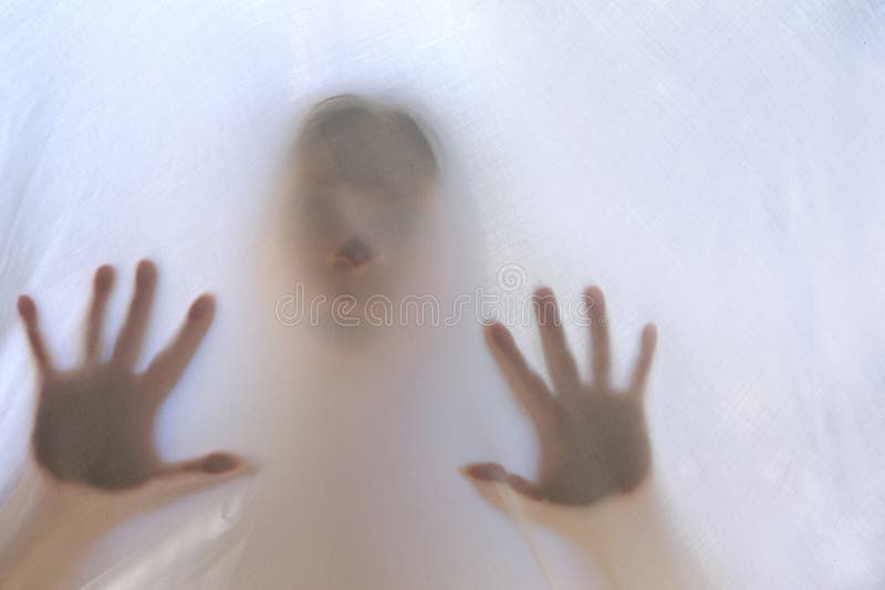 eerie blurry hands and face of people as if they have been trapped behind glass, dense fabric, wrap, ghost, spirit trying to reach