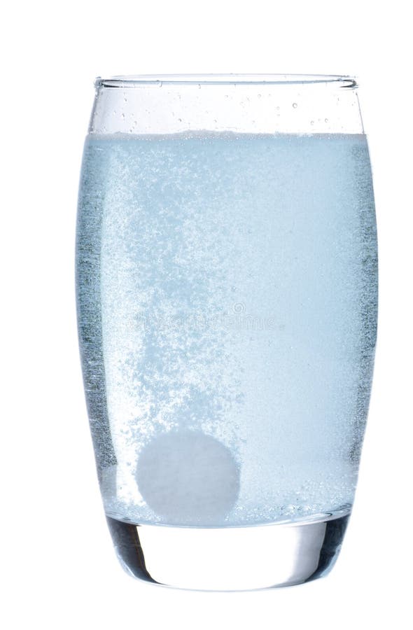 Effervescent tablet in glass with water stock photos Effervescent tablet in glass with water stock photos