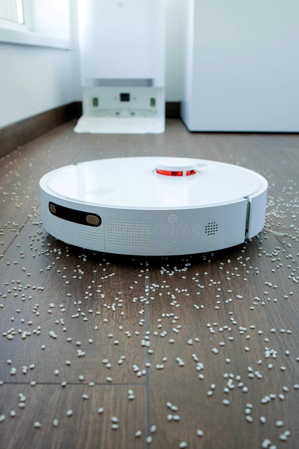 Efficient Robotic Vacuum Cleaner Cleans Rice on the Floor. Cleans