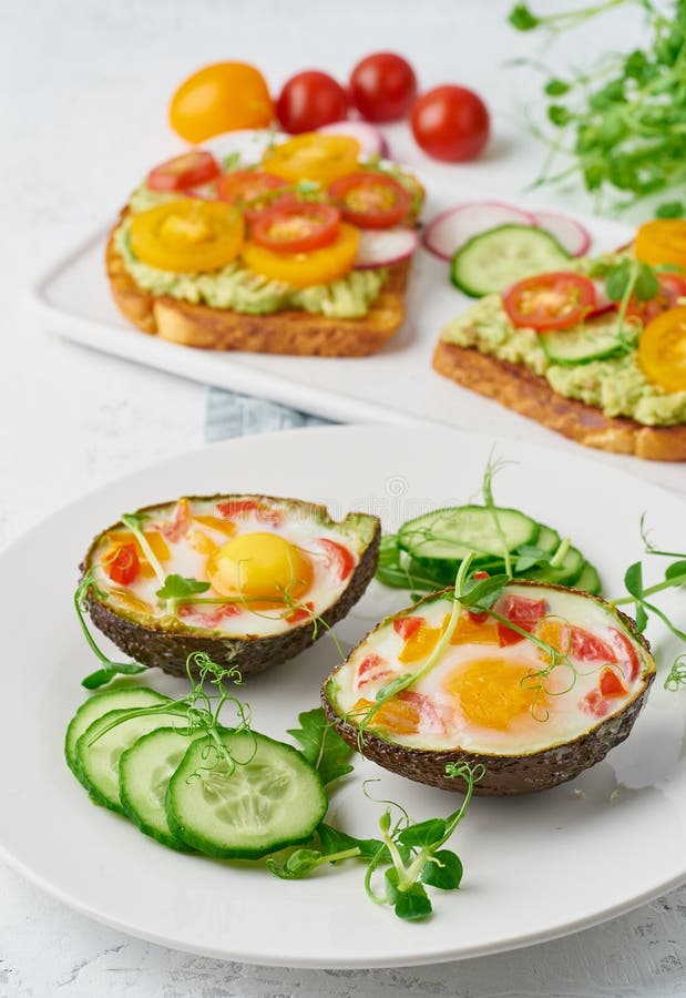 Egg baked in avocado, toast, breakfast, closeup royalty free stock image Egg baked in avocado, toast, breakfast, closeup royalty free stock image