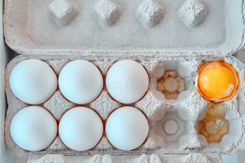 Egg is Damaged in a Bag of 10 Pieces and Spilled into a Cardboard