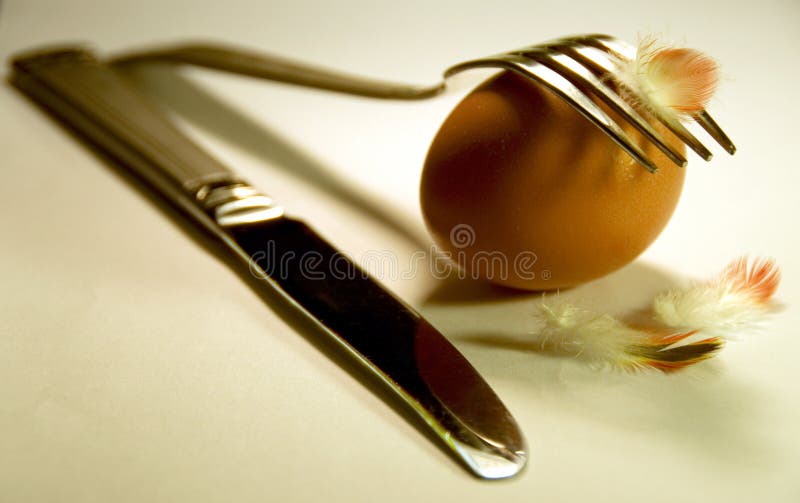 Egg With A Fork And Knife Picture. Image 4790303