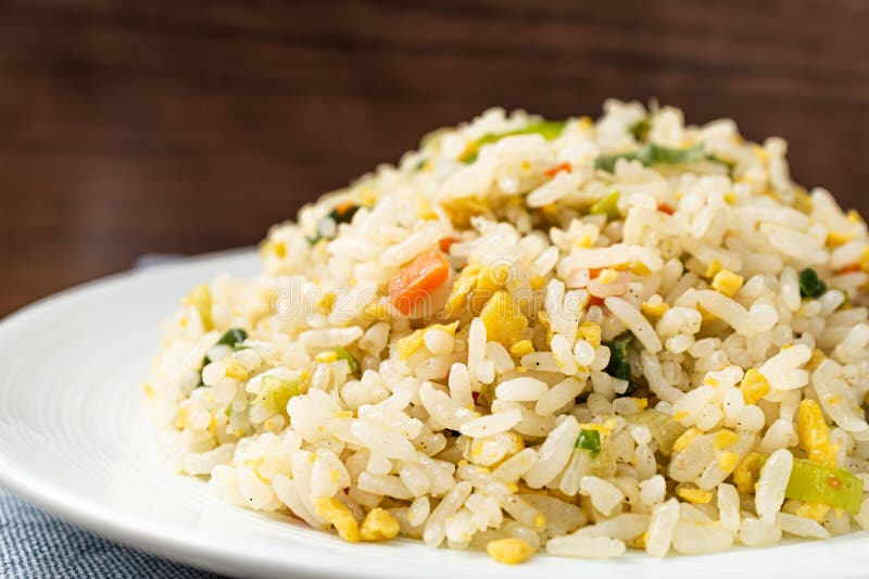 Egg Fried Rice Made by Stir-frying Eggs, Rice and Vegetables Stock
