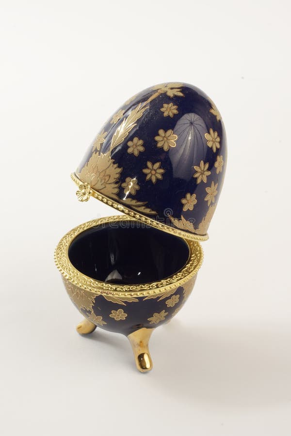 Egg on legs stock photo. Image of cover, gold, opens, three 7505390