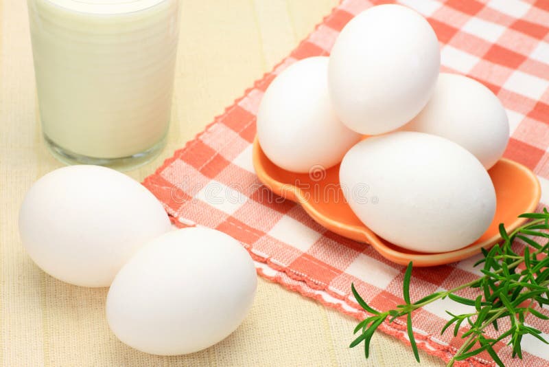 Egg in Milk stock photo. Image of color, drowned, background 16333660