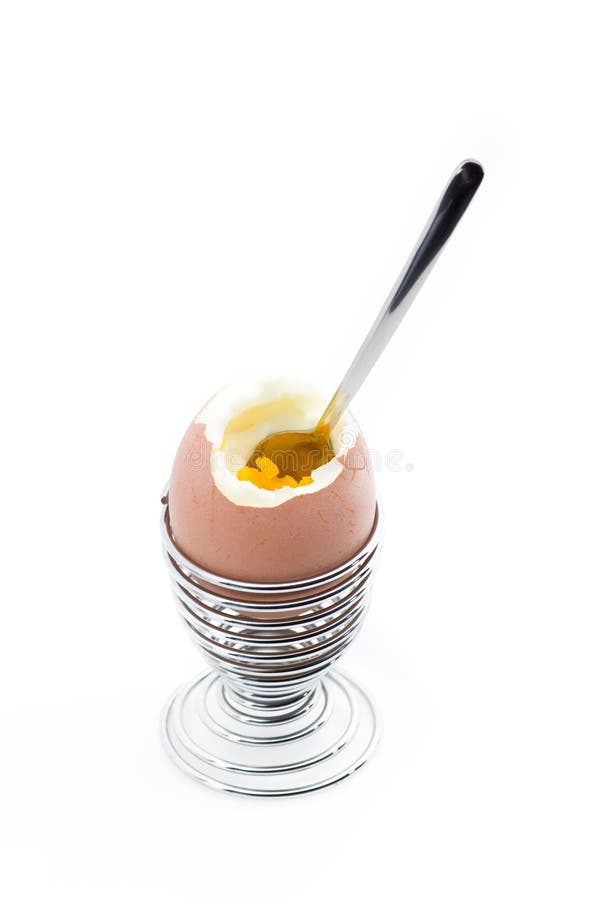 An eggcup with an open egg