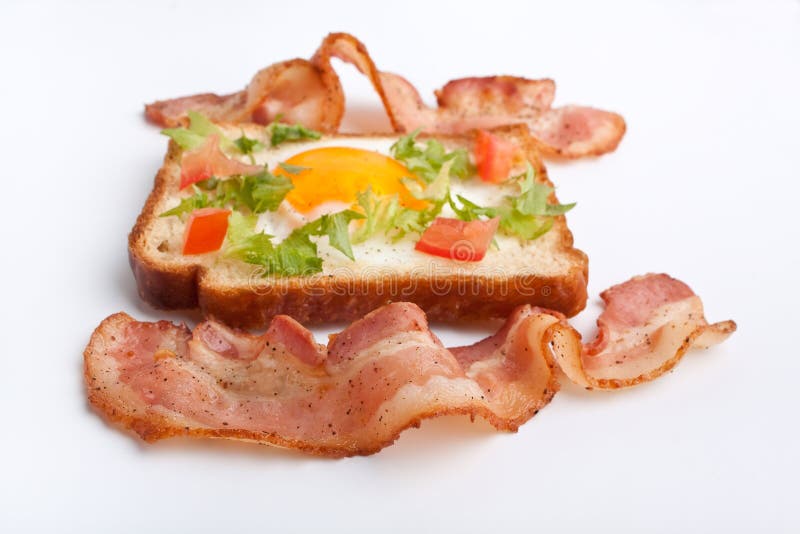 Eggie Brot und gebratener Speck lizenzfreie stockbilder