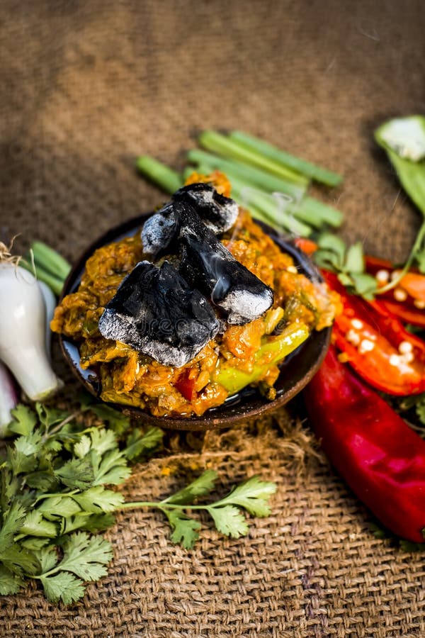 Famous Indian &amp; Gujarati Dish I.e. Baingan Ka Bhurta in a Clay Bowl on ...