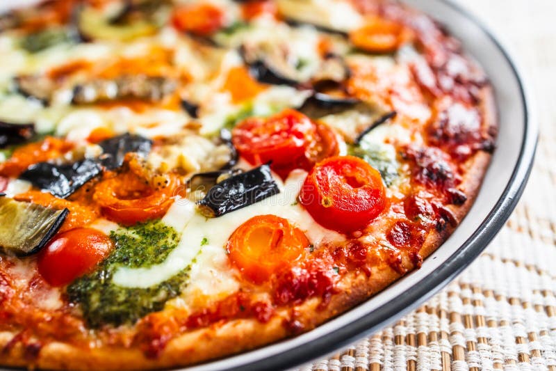 Eggplant and pesto pizza stock photo. Image of lunch 302141586