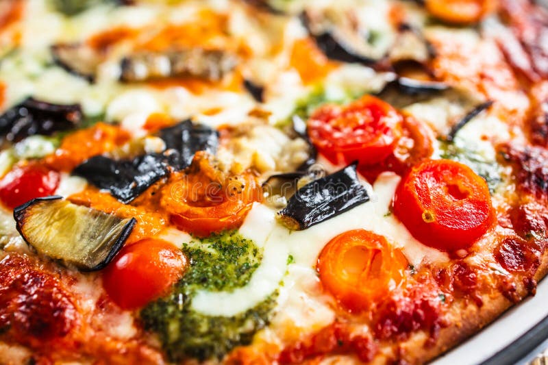 Eggplant and pesto pizza stock photo. Image of product 302141598