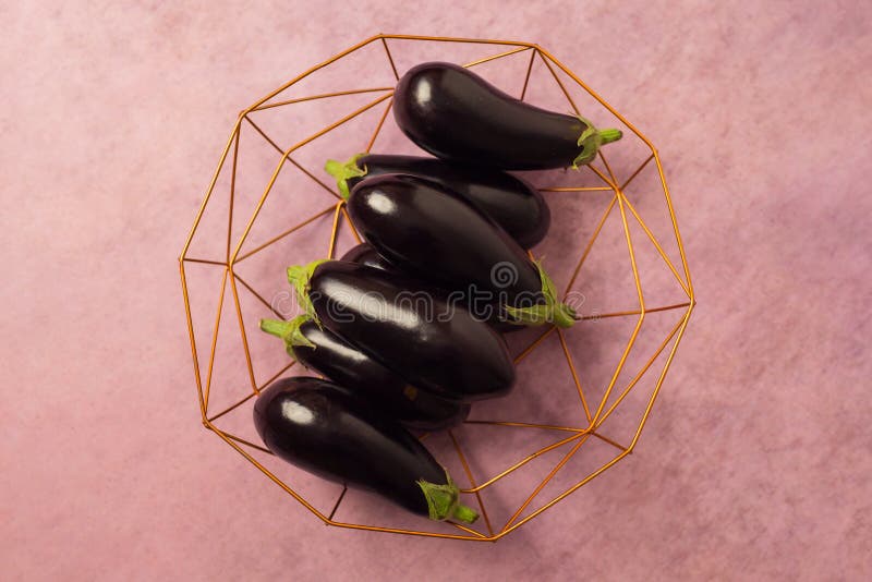 Eggplants in an iron bowl stock photo. Image of inside 263334536