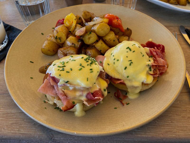 An Eggs Benedict Breakfast in California Stock Photo Image of onions