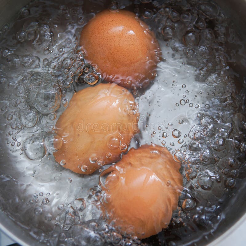 Eggs in boiling water royalty free stock image Eggs in boiling water royalty free stock image