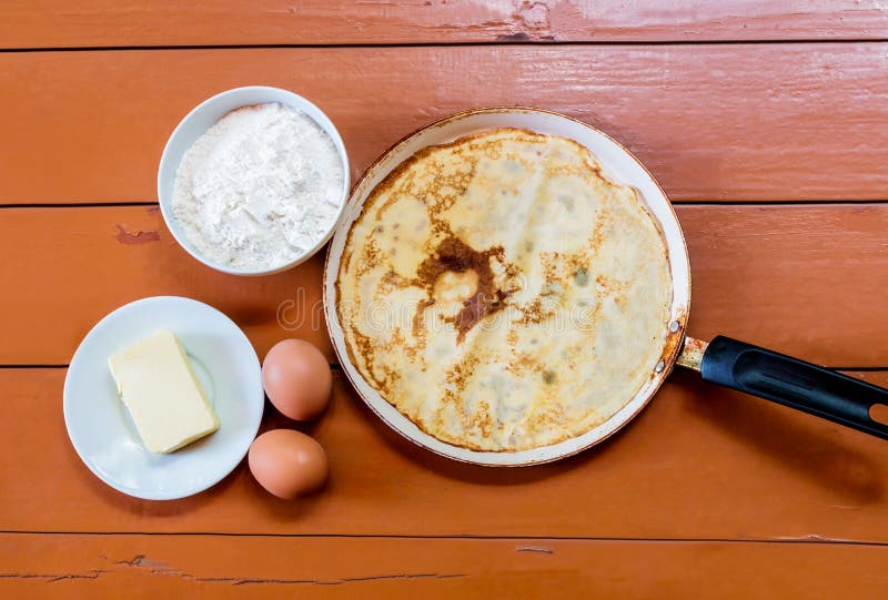 Eggs, Butter, Flour and Frying Pan with Pancake Stock Image - Image of ...