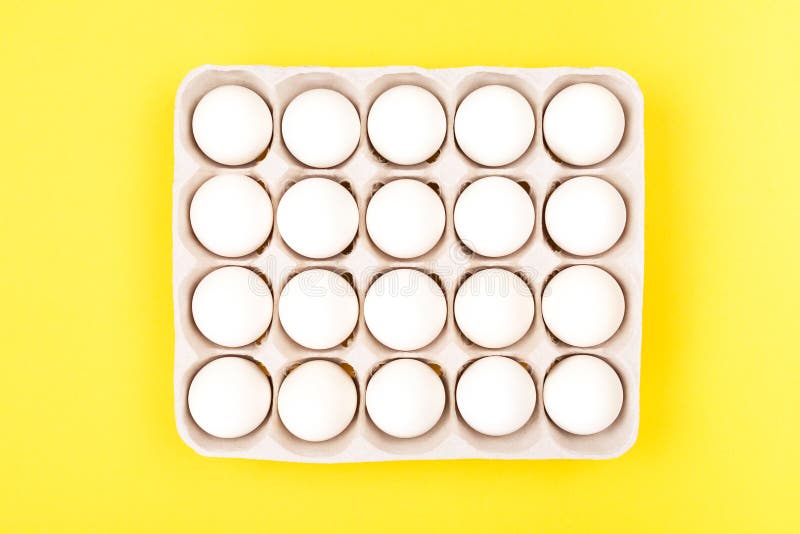 Eggs in Egg Box on Yellow Background Stock Photo Image of cooking