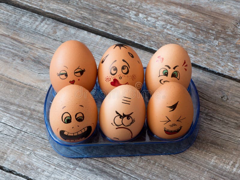 https://thumbs.dreamstime.com/b/eggs-painted-faces-photo-your-design-concept-joint-group-carton-box-cheerful-mischievous-having-fun-97040528.jpg