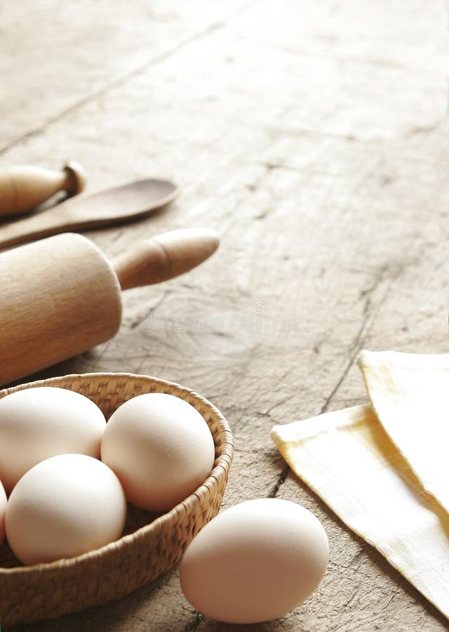 Eggs, rolling-pin, wooden spoon