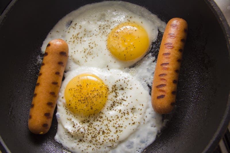 Eggs with sausages stock photo. Image of yellow, portion - 60244682