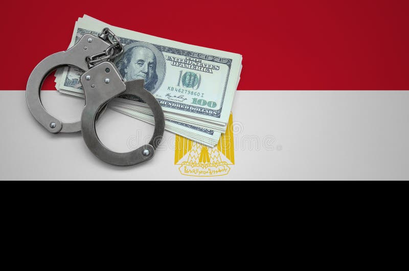 Egypt Flag with Handcuffs and a Bundle of Dollars. the Concept of Breaking the Law and Thieves