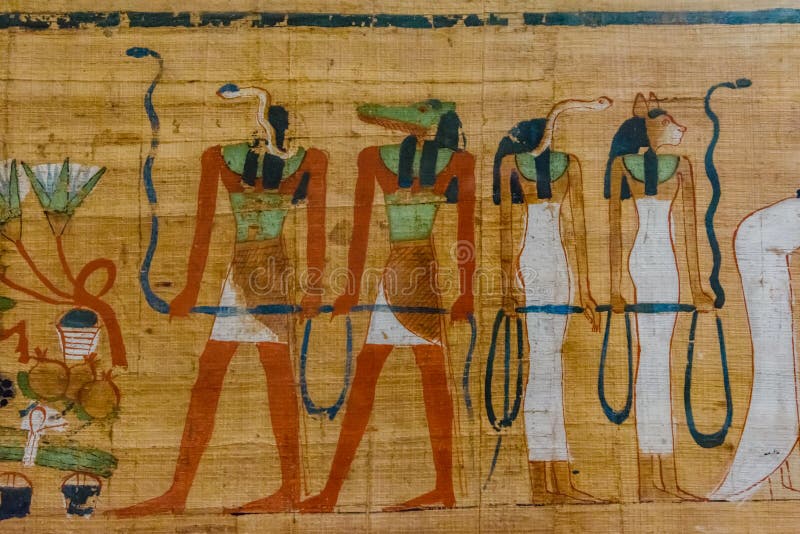 Egyptian ancient papyrus with the different pictures and hieroglyphics