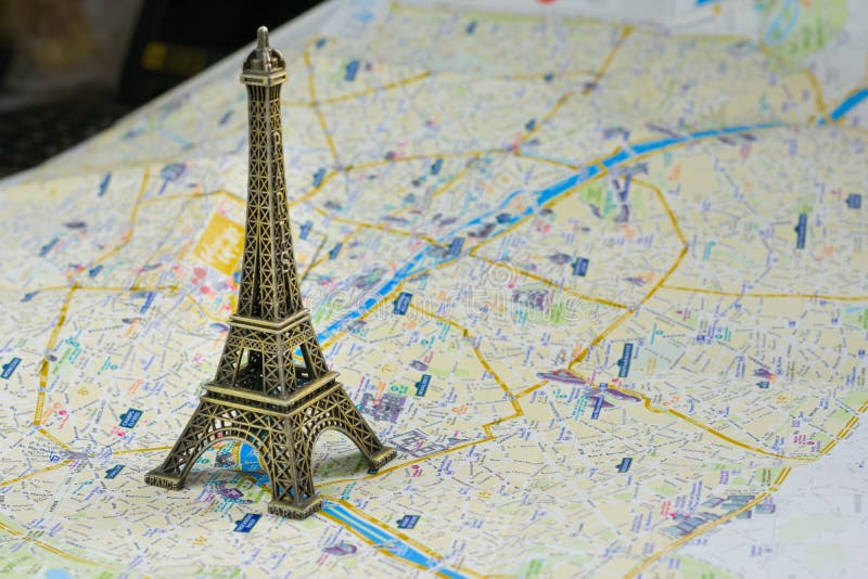 Eiffel Tower and Map of Paris Stock Photo - Image of closeup, search