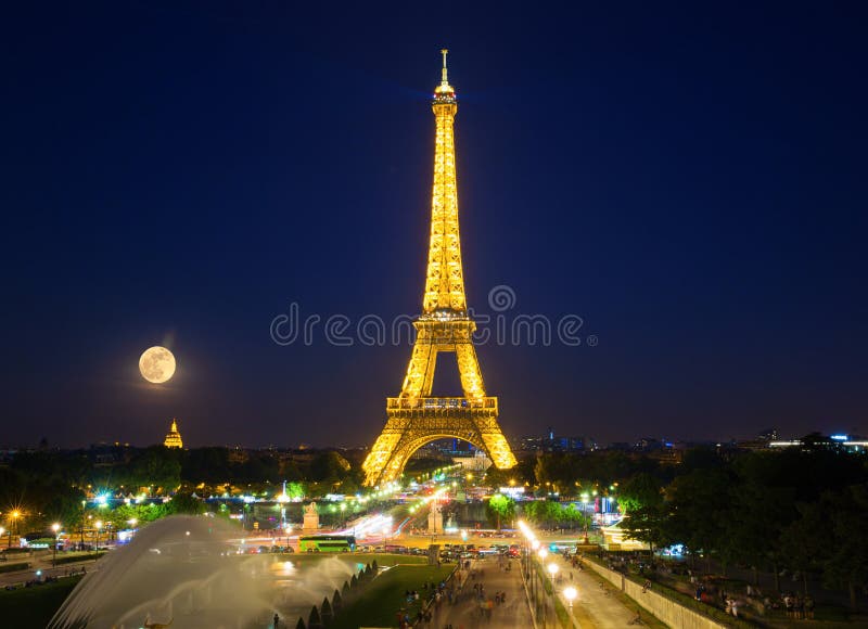 Eiffel Tower with super moon stock photos
