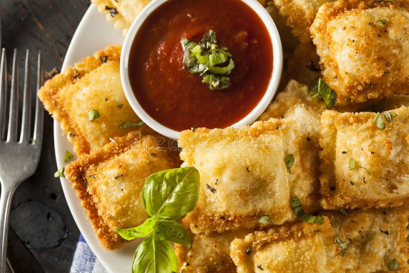 Homemade Fried Ravioli with Marinara Sauce and Basil. Homemade Fried Ravioli with Marinara Sauce and Basil