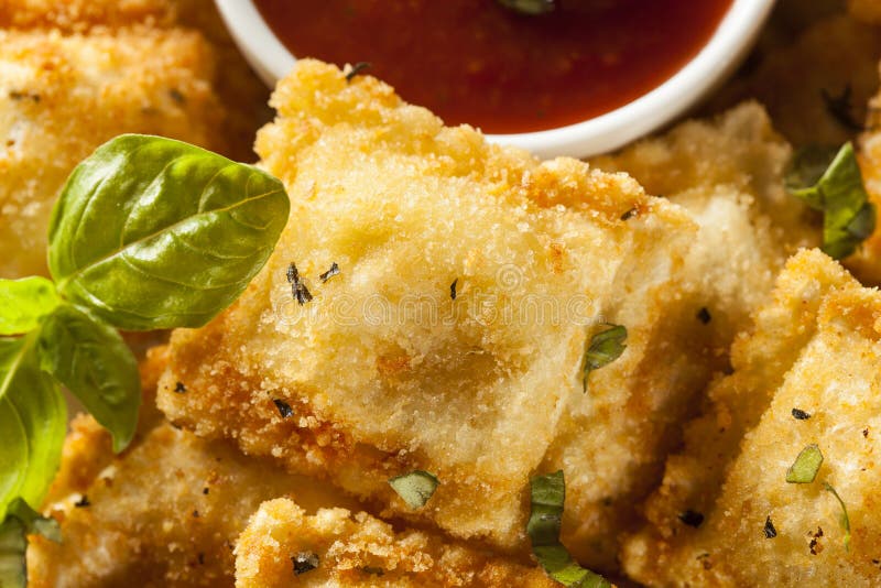 Homemade Fried Ravioli with Marinara Sauce and Basil. Homemade Fried Ravioli with Marinara Sauce and Basil