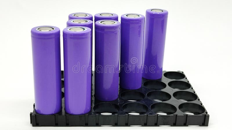 Battery and holder in electric system with white background stock photography