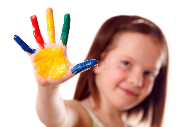 Eight year old girl with colorful hand