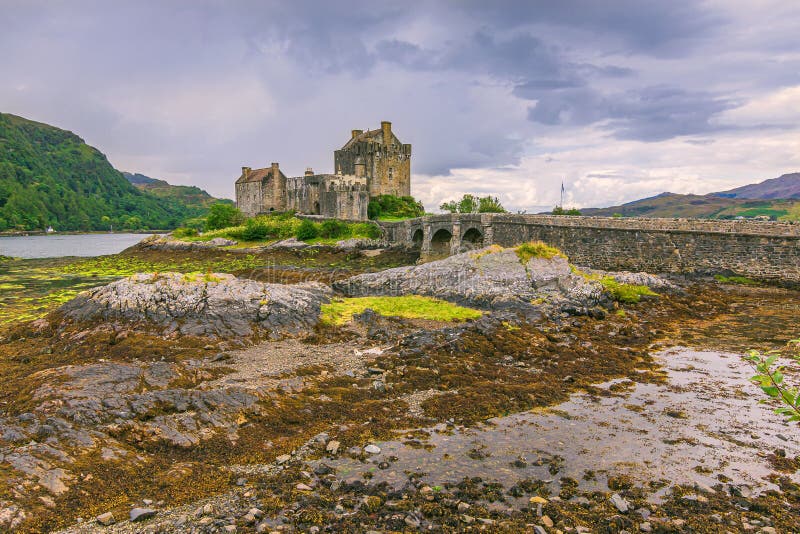 Eilean Donan Castle at Low Water with Stone Bridge Stock Photo - Image ...