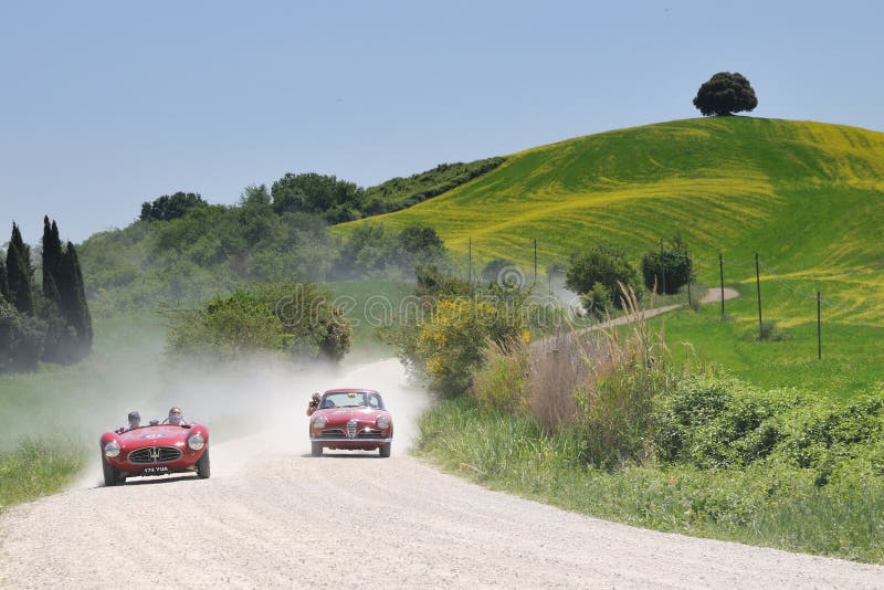 Ein 1954 Rot Maserati und Alfa Romeo 1955 stockfotos