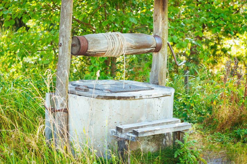 an old well in a village near a summer day field, air, background, beautiful, beauty, bucket, carefree, caucasian, child, childhood, daughter, dream, eco, emotion, expression, expressionism, fairy, girl, grass, green, happiness, jug, light, love, nature, one, outdoor, outside, raglan, space, spring, strip, style, sun, trees, trust, vintage, warmth, wellness, white, wooden. an old well in a village near a summer day field, air, background, beautiful, beauty, bucket, carefree, caucasian, child, childhood, daughter, dream, eco, emotion, expression, expressionism, fairy, girl, grass, green, happiness, jug, light, love, nature, one, outdoor, outside, raglan, space, spring, strip, style, sun, trees, trust, vintage, warmth, wellness, white, wooden