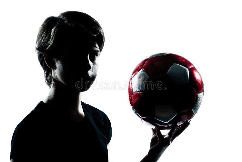Ein Jugendlichjungen-Mädchenschattenbild, welches das Zeigen von Fußball footba hält lizenzfreies stockfoto Ein Jugendlichjungen-Mädchenschattenbild, welches das Zeigen von Fußball footba hält lizenzfreies stockfoto