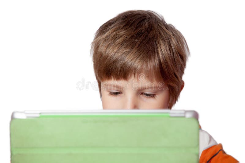 Ein Junge mit einem Tablet-Computer stockbilder Ein Junge mit einem Tablet-Computer stockbilder