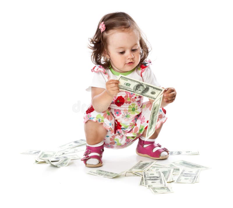 Ein kleines Mädchen mit Geld lizenzfreies stockfoto Ein kleines Mädchen mit Geld lizenzfreies stockfoto