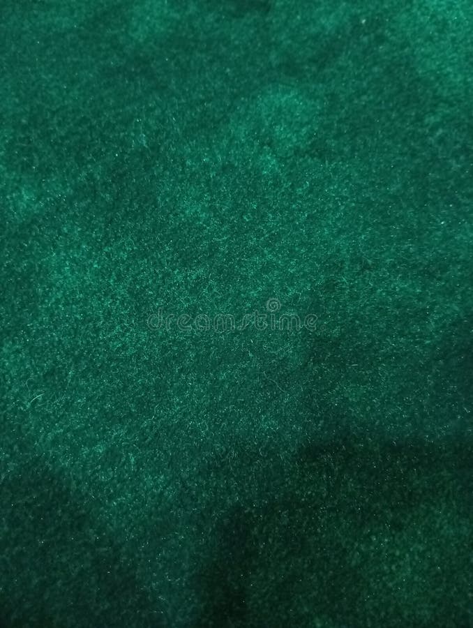 Ein verschwommenes Bild eines grünen Teppichs lizenzfreie stockfotos