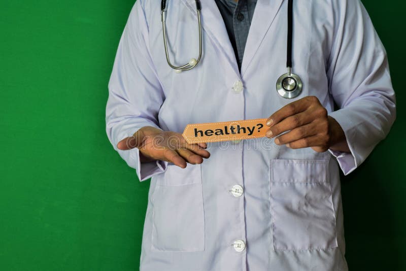Eine Doktorstellung, halten das gesunde? Papiertext auf grünem Hintergrund Medizinisches und Gesundheitswesenkonzept stockfoto Eine Doktorstellung, halten das gesunde? Papiertext auf grünem Hintergrund Medizinisches und Gesundheitswesenkonzept stockfoto