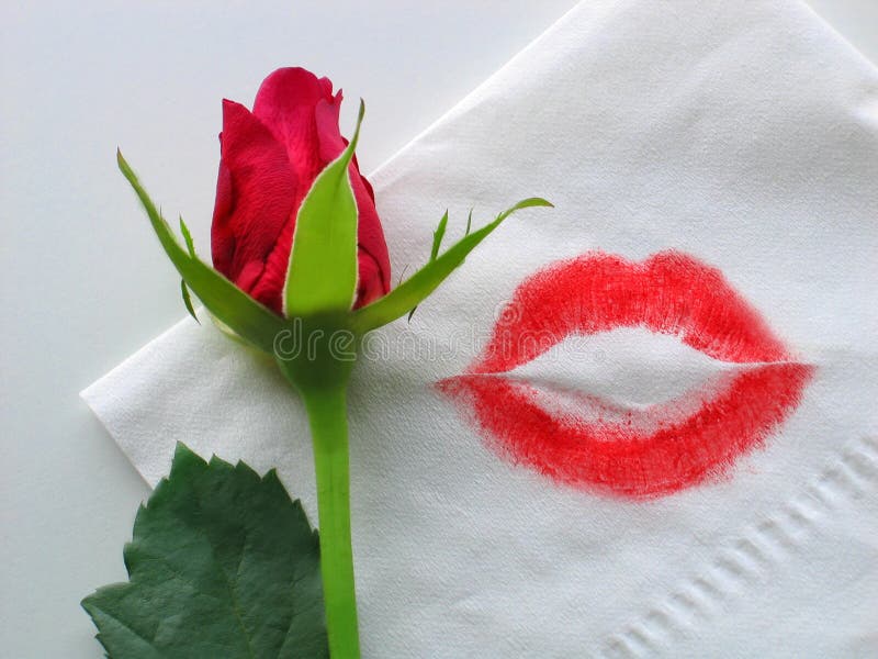 Eine Rose und ein Lippenstiftkuß