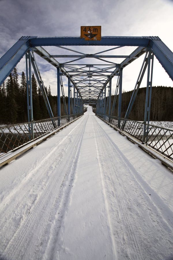 A narrow bridge in winter in Alberta Canada. A narrow bridge in winter in Alberta Canada