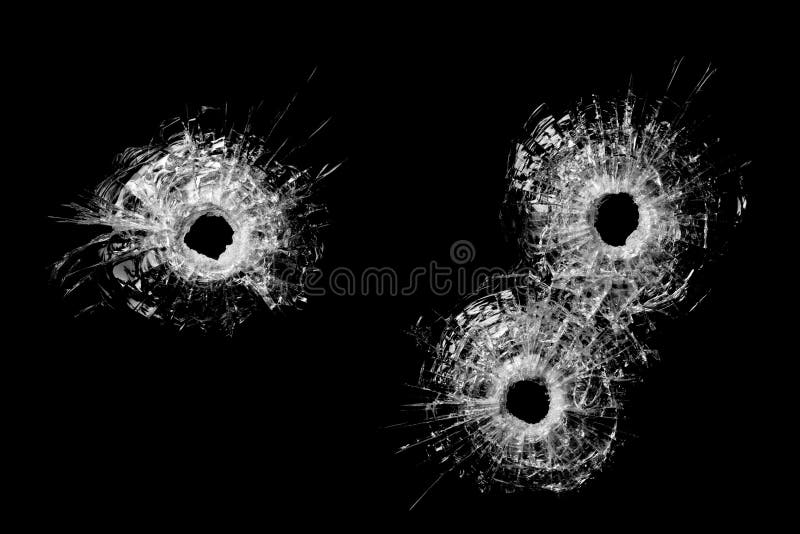 Bullet holes in glass isolated on black - bullet holes from .40 handgun closeup. Bullet holes in glass isolated on black - bullet holes from .40 handgun closeup