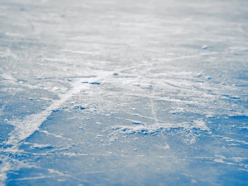 Eishockeyfeldoberflächenhintergrund, abstraktes blaues Eis, selektiv