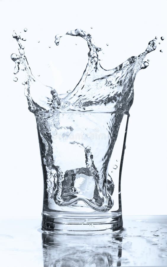 Ice cube splash in a water glass. Ice cube splash in a water glass