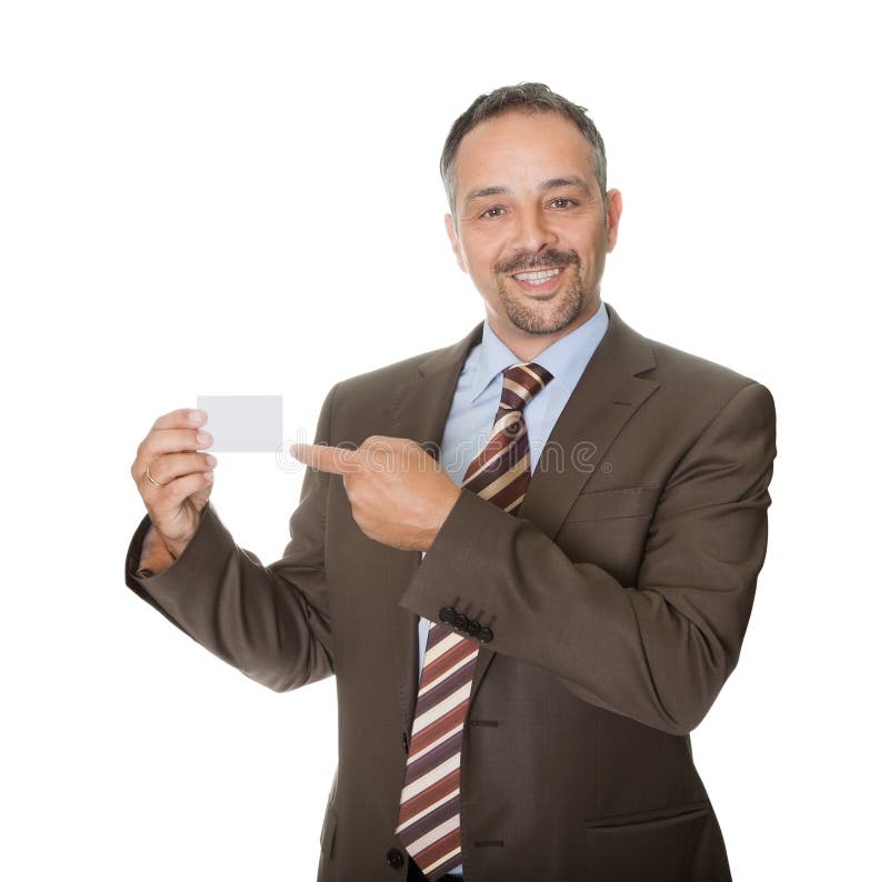 Ejecutivo feliz que muestra una tarjeta de visita en blanco imagenes de archivo Ejecutivo feliz que muestra una tarjeta de visita en blanco imagenes de archivo