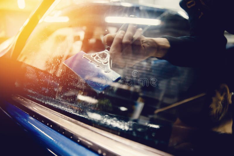 Película de tintado para coche con secador de pelo Fotografía de